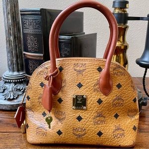 👛SALE! “MCM” 💯% Authentic Mini Heritage Bowler Purse